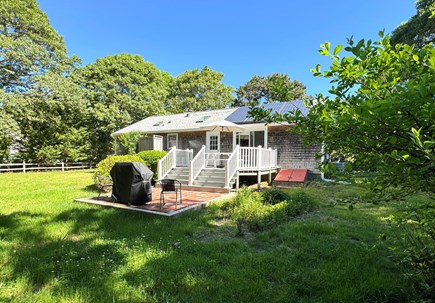 Eastham Cape Cod vacation rental - Backyard, deck, picnic table, patio, bbq