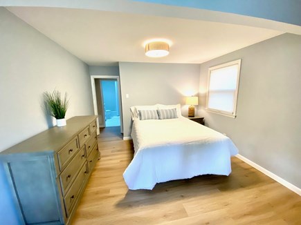 Eastham Cape Cod vacation rental - Lovely Queen bedroom with desk looking out to yard.