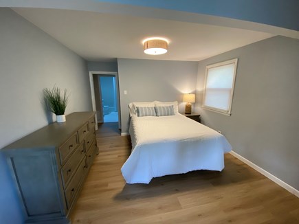 Eastham Cape Cod vacation rental - Queen bedroom with dresser, desk and spacious closet.