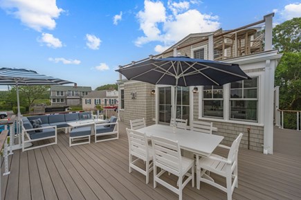 Chatham Cape Cod vacation rental - Main deck area of the home offers guests both dining and lounge areas