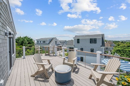 Chatham Cape Cod vacation rental - Spend nights cuddled up in an Adirondack chair on the upper deck, sitting near the Solo Stove