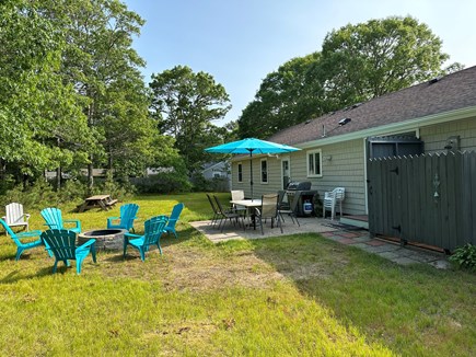 South Yarmouth Cape Cod vacation rental - Private backyard - patio, grill, fire pit, outdoor shower