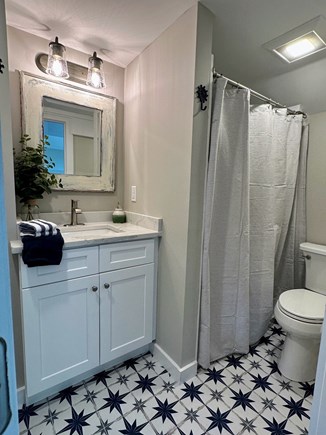 Dennis Cape Cod vacation rental - Fully renovated bathroom with washer & dryer