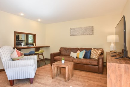 Brewster Cape Cod vacation rental - Living area with live-edge wood countertop/
