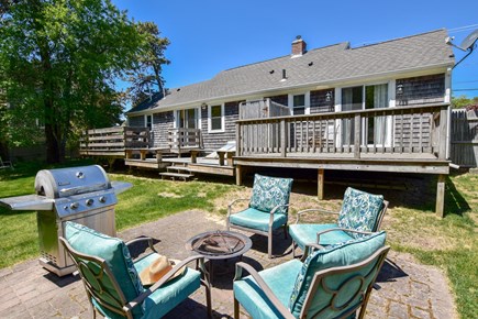 Dennis Cape Cod vacation rental - Backyard patio with firepit