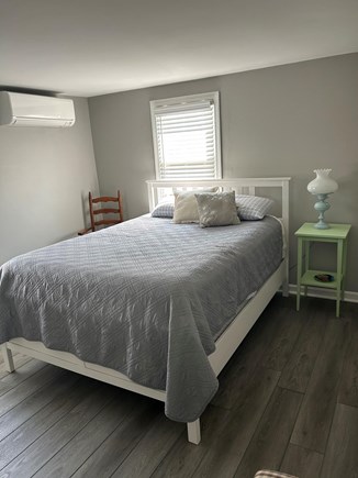 Centerville Cape Cod vacation rental - Bedroom with a queen bed and a mini-split (heat and A/C)