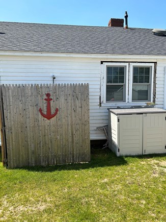 Centerville Cape Cod vacation rental - Outdoor shower. Storage container has beach chairs