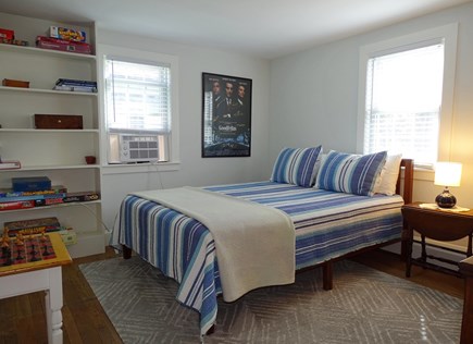 Harwich Cape Cod vacation rental - Main floor queen bedroom with many games