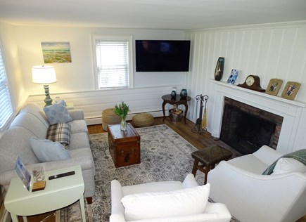 Harwich Cape Cod vacation rental - Living room with fireplace