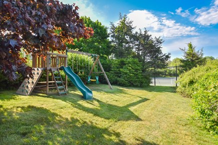 Barnstable Cape Cod vacation rental - Tennis court and playset- court is private to home.