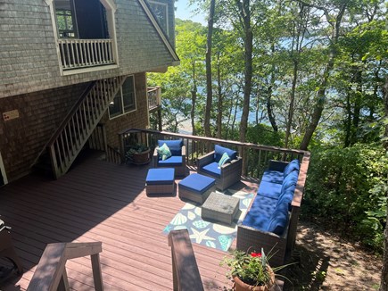 Brewster Cape Cod vacation rental - Main deck (of 3) with seating for 5 and a gas grill.
