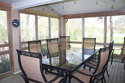 West Hyannis Port Cape Cod vacation rental - Family meals in the outdoor screened in porch