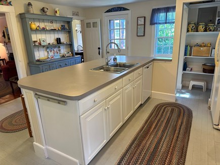 Wellfleet Cape Cod vacation rental - Kitchen opens to living, dining, laundry, outdoor shower, patio