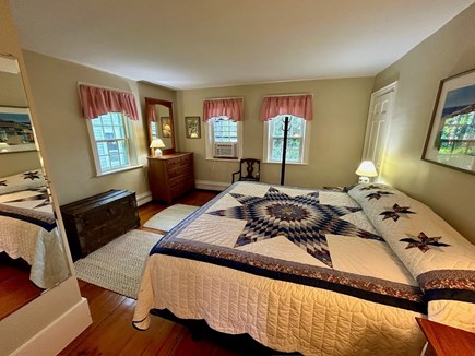 Wellfleet Cape Cod vacation rental - First floor primary bedroom with CA king w/ window A/C