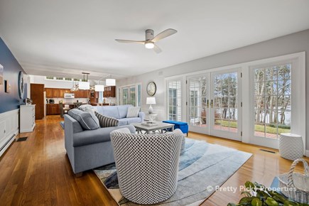 Brewster Cape Cod vacation rental - Comfortable lounge seating with a water view.