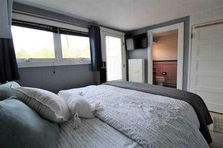 Provincetown Cape Cod vacation rental - Bedroom looking to back door and bathroom