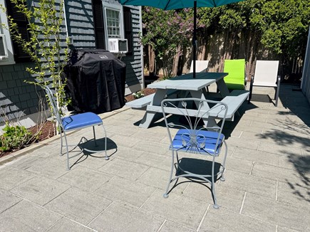 South Yarmouth Cape Cod vacation rental - Patio with table, umbrella, chairs and gas grille