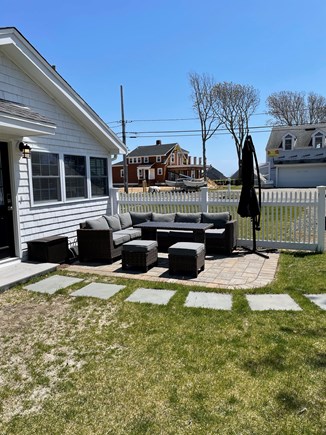 West Yarmouth Cape Cod vacation rental - Outdoor patio with couch, table and large umbrella