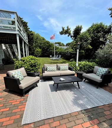 Harwich Port Cape Cod vacation rental - Outdoor Patio and Living area with grill and picnic table
