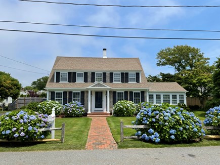 Harwich Port Cape Cod vacation rental - Front view of home, lovely landscaping in front and rear of home