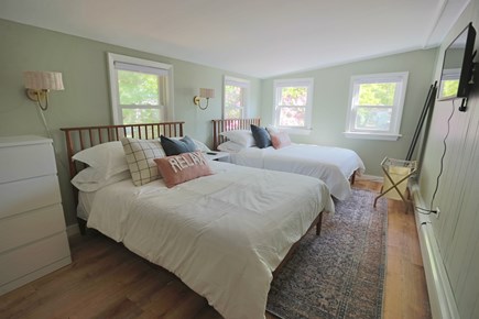 East Falmouth Cape Cod vacation rental - Green room with 2 double beds, desk, and smart TV