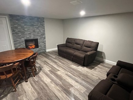Dennis Cape Cod vacation rental - Basement area/fireplace
