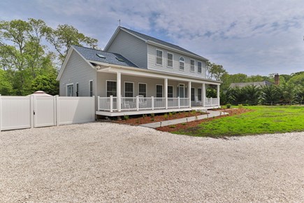 Eastham Cape Cod vacation rental - A porch w/ 4 rocking chairs and a driveway w/ 6+ parking spots