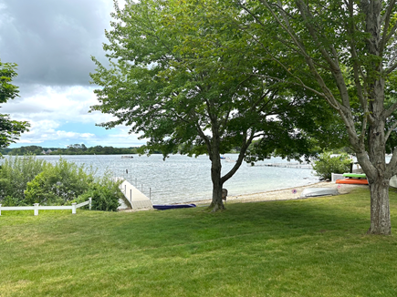 Centerville, Wequaquet Lake Cape Cod vacation rental - View of the spacious backyard for games and dock/beach