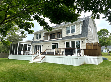 Centerville, Wequaquet Lake Cape Cod vacation rental - View of backyard, outdoor shower, deck, porch, grill, etc.