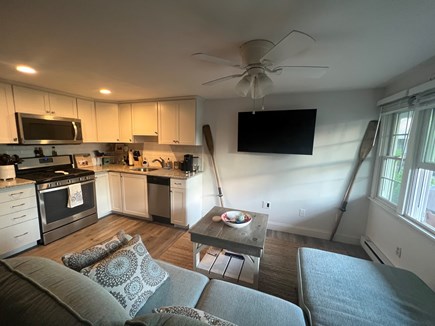 Harwich, Wyndemere Condominiums Cape Cod vacation rental - Living room / Kitchen space. Featuring a queen pull-out couch