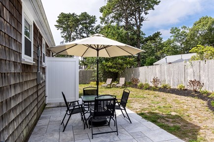 West Dennis Cape Cod vacation rental - Enjoy dinner in the shade