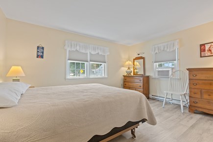 West Dennis Cape Cod vacation rental - Main bedroom with window AC and queen