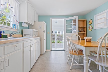 West Dennis Cape Cod vacation rental - Kitchen out to sunroom