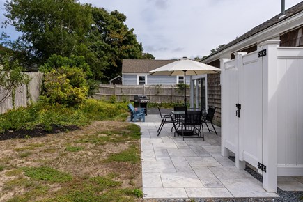 West Dennis Cape Cod vacation rental - Back patio with outdoor shower