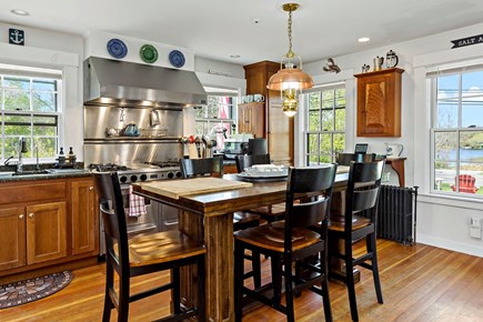 Barnstable Cape Cod vacation rental - The chef's kitchen looks over 6A to the dairy's former pond.