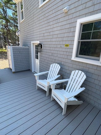 Herring Pond Area - Eastham Cape Cod vacation rental - Outdoor shower and small deck with gas grille.