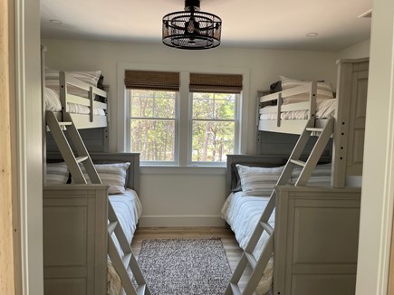 Herring Pond Area - Eastham Cape Cod vacation rental - Bunkroom with 2 twin-over-full beds for flexible sleeping.