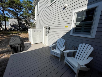 Herring Pond Area - Eastham Cape Cod vacation rental - Deck with seating, gas grill and outdoor shower.