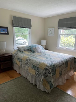 Harwich Cape Cod vacation rental - Primary bedroom with two dressers and one queen sized bed.