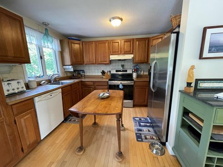 Harwich Cape Cod vacation rental - Kitchen with dishwasher and induction range with air fry oven.