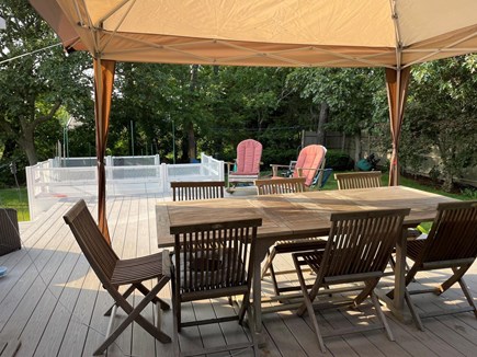Harwich Cape Cod vacation rental - Canopy on deck makes a delightful place to eat meals & play games