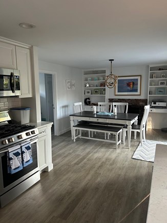 Falmouth, Great Harbors Cape Cod vacation rental - Eat in kitchen has a slider with access to the deck.