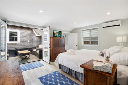 Centerville Cape Cod vacation rental - Suite D - Large King Bed w/ Closet and TV and Outside Retreat