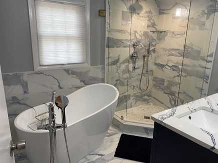Yarmouth Cape Cod vacation rental - First Floor Bath with soaking tub, glass shower and double sink