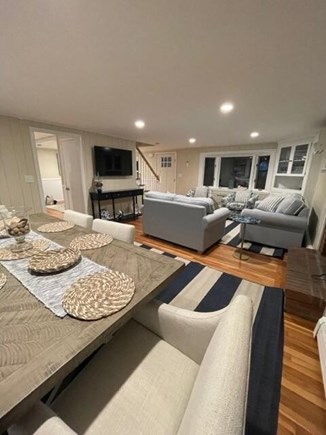Yarmouth Cape Cod vacation rental - Living Room with AC, TV, and oversized dining table for games