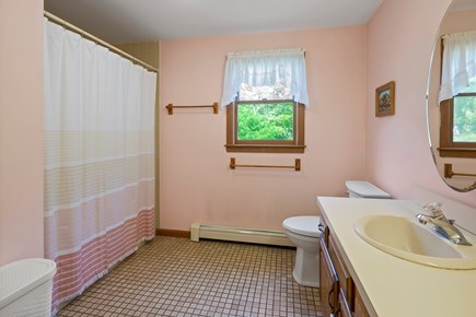 South Dennis Cape Cod vacation rental - First floor full bathroom with stand up shower and tub