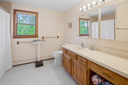 South Dennis Cape Cod vacation rental - Second floor bathroom with a stand up shower and tub