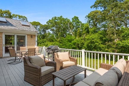 South Dennis Cape Cod vacation rental - Lounge on the patio furniture or gather for a cookout