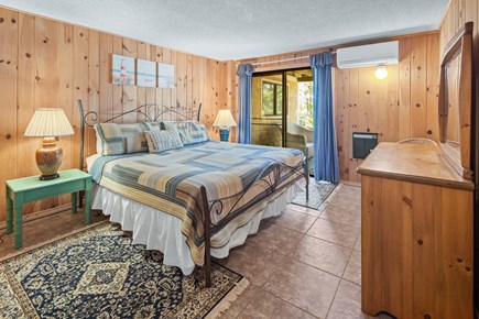 Wellfleet Cape Cod vacation rental - Bedroom with king bed, classic Cape Cod knotty pine paneling