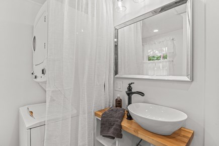 Dennis Cape Cod vacation rental - Bathroom sink, washer and dryer